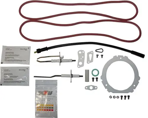 Wartungsset mit verschiedenen Teilen, einschließlich Dichtungen, Rohren und Montagezubehör. Enthält Produkte der Marke Wolf.